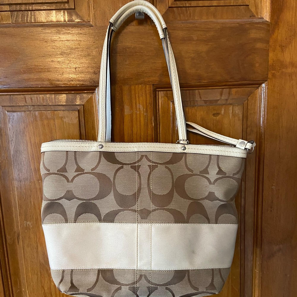 Lightly used Coach purse AND fabric cleaner